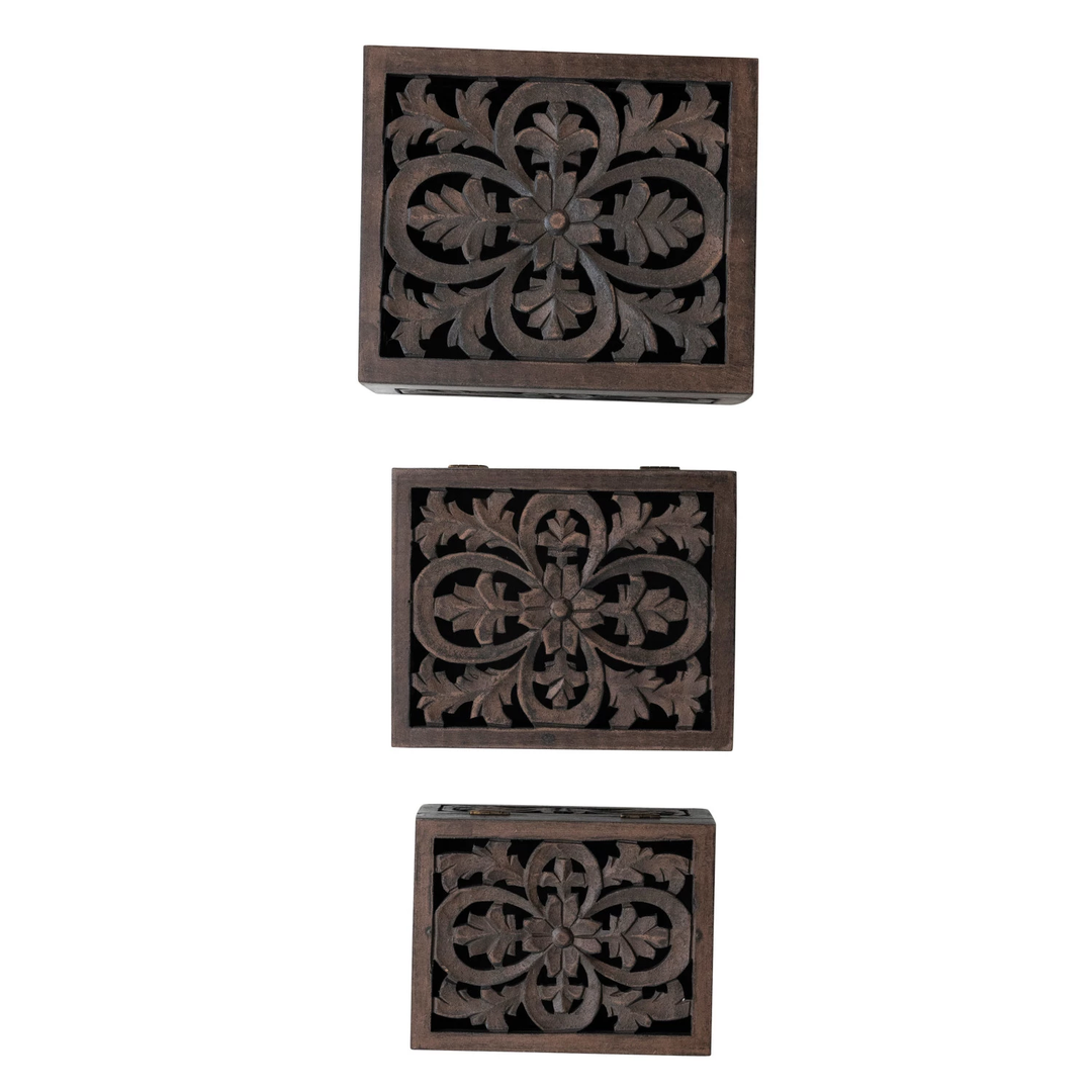 Set of three nesting boxes carved from MDF with mango wood accents in a natural finish.