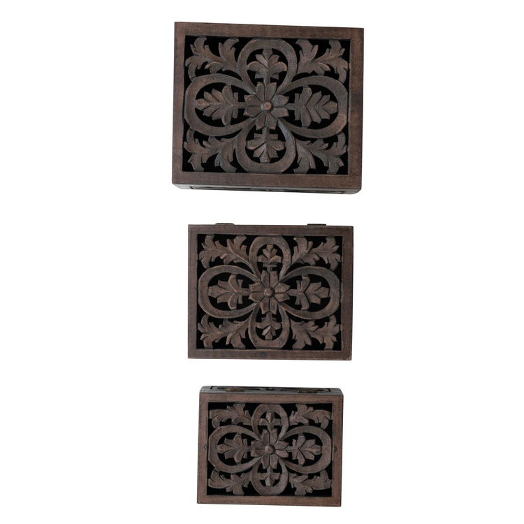 Set of three nesting boxes carved from MDF with mango wood accents in a natural finish.