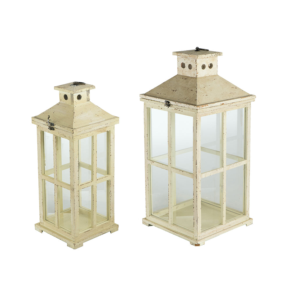 Set of two rustic white finish candle lanterns made from fir wood and glass.