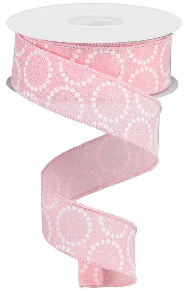 Roll of pale pink pearl beads on royal made from polyester