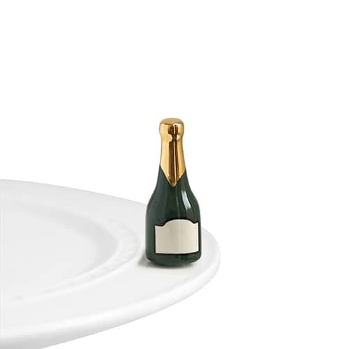 Mini champagne bottle with 'Champagne Celebration' text on a gold label.