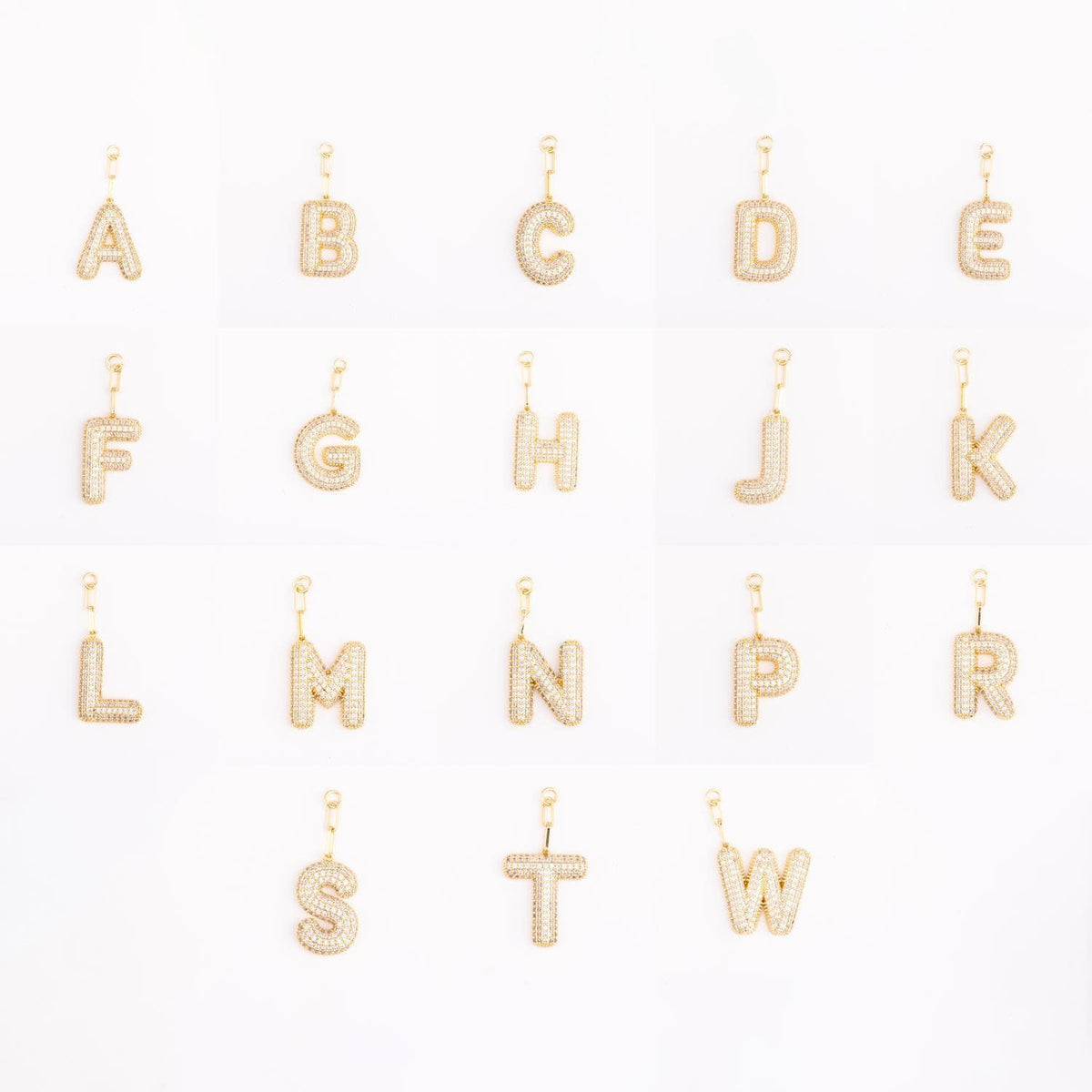 Heather-colored pave crystal charm bag accessory with gold plating and initial engraving