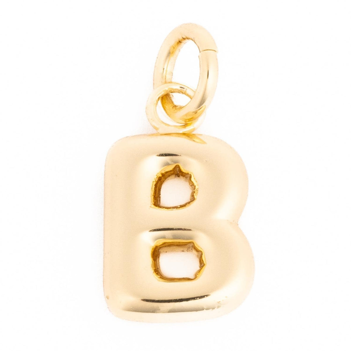 Gold-tone Charm Cami pendant with a delicate chain link.