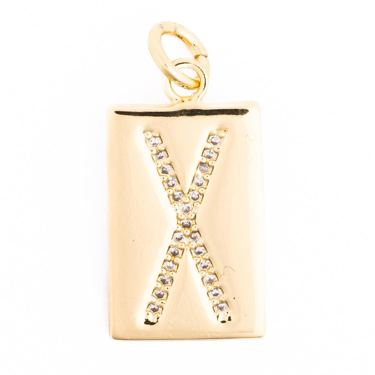 Charm Christine necklace featuring an interchangeable initial charm on a delicate chain.