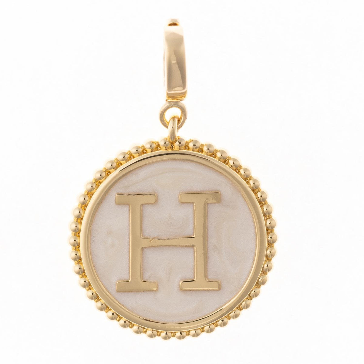 Circular .5-inch charm in 18k gold plating with faux mother-of-pearl inlay and clasp.