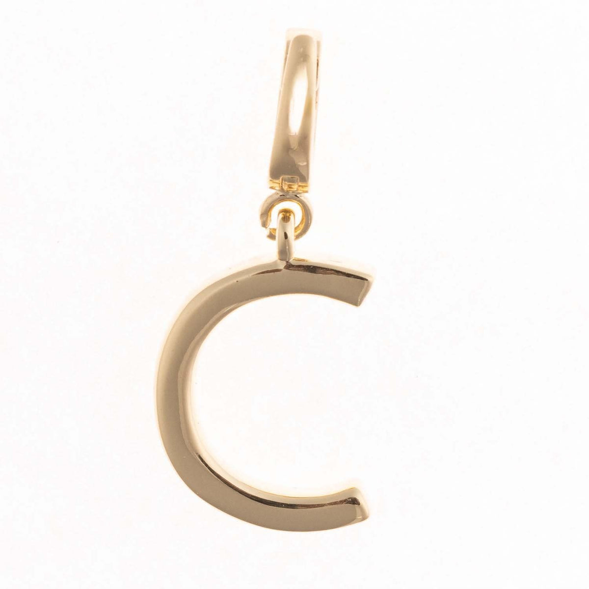 Gold-plated Charm Tia pendant with a .5-inch length featuring an open silhouette and nickel-free clasp.