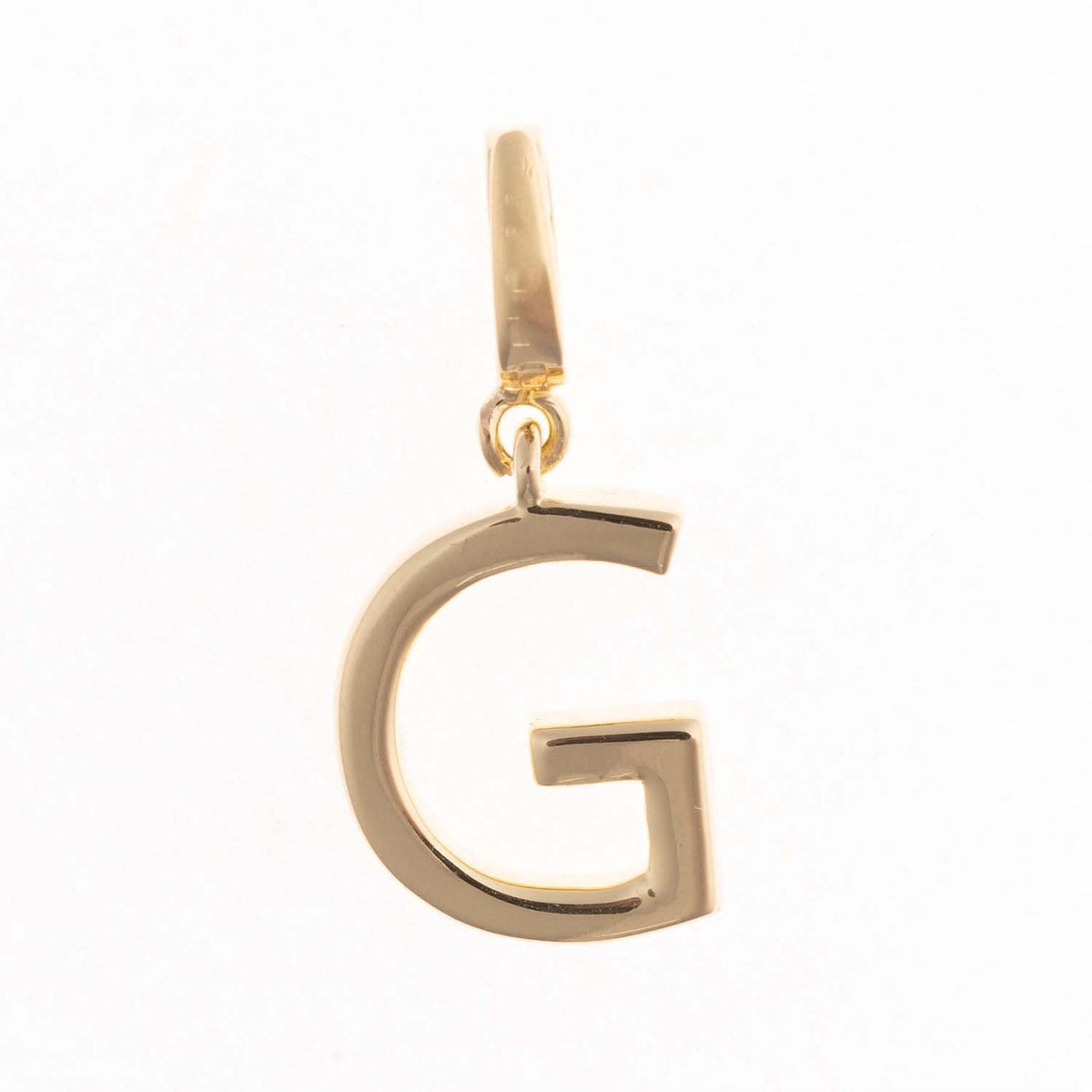 Gold-plated Charm Tia pendant with a .5-inch length featuring a clasp to attach to chain.