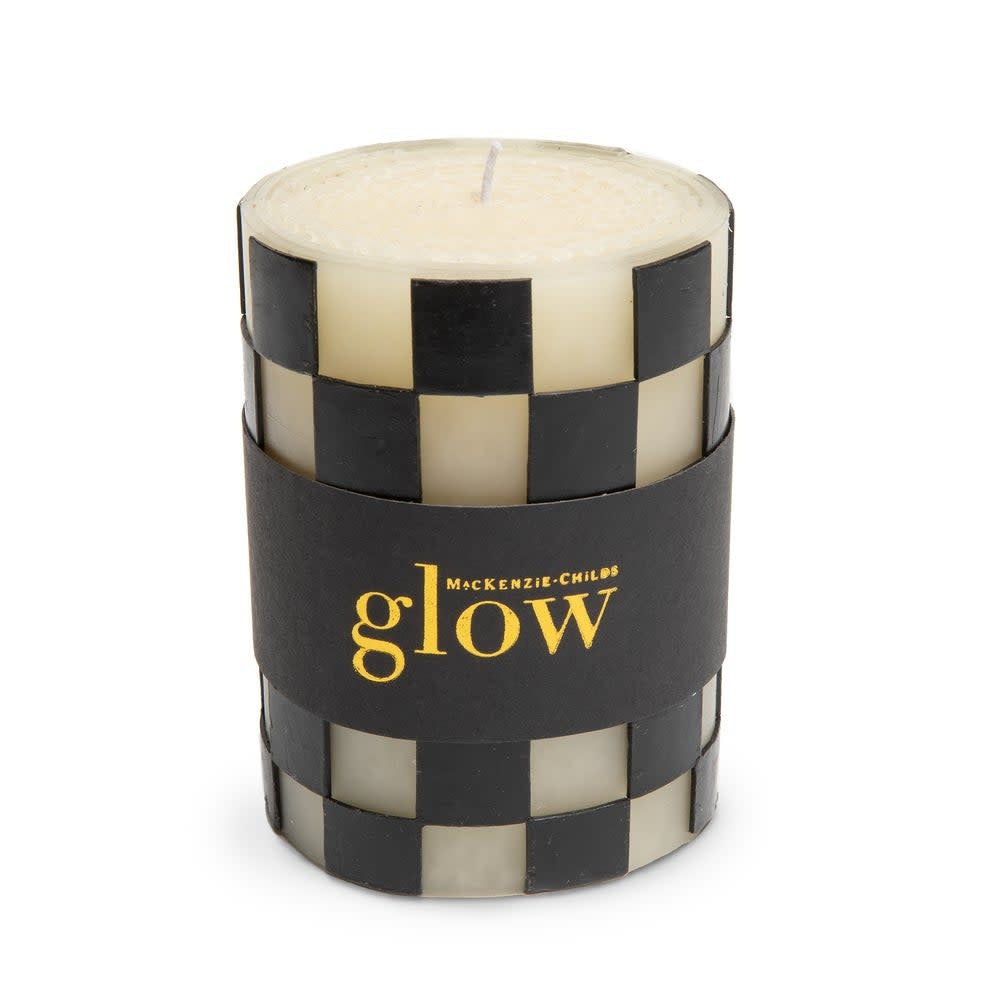 Four-inch black pillar candle made from a hand-rolled beeswax paraffin blend with a smooth cylindrical shape.