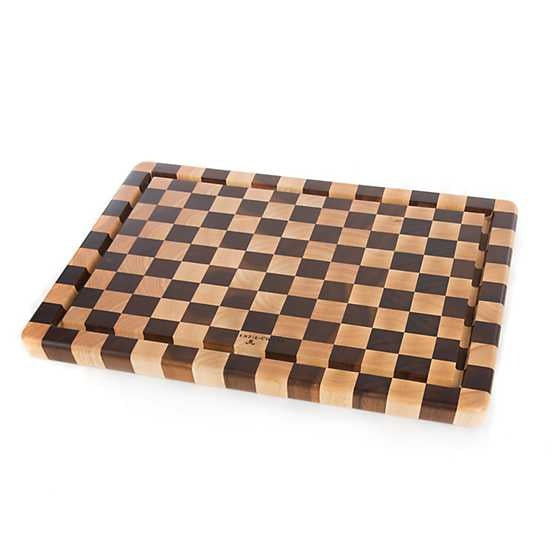 Side view of a handmade check carving board made from acacia and rubberwood with natural wood grain.