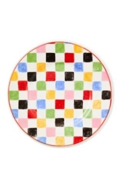 White stoneware dinner plate with a black checkered rim pattern.