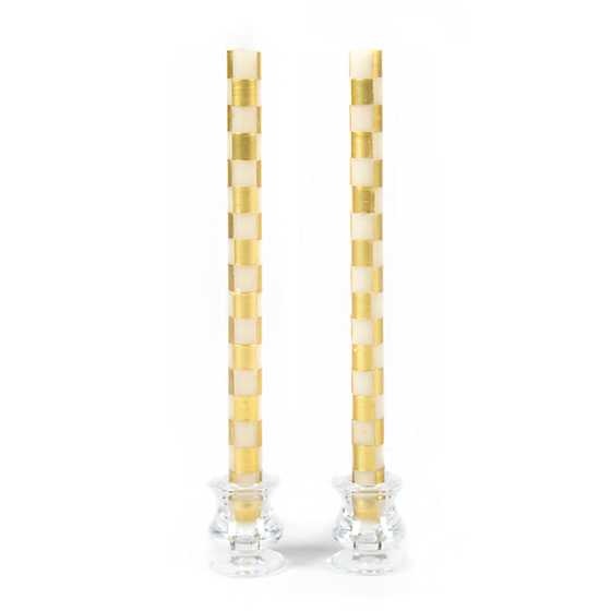 Set of two gold checkered beeswax-blend dinner candles with ivory accents.