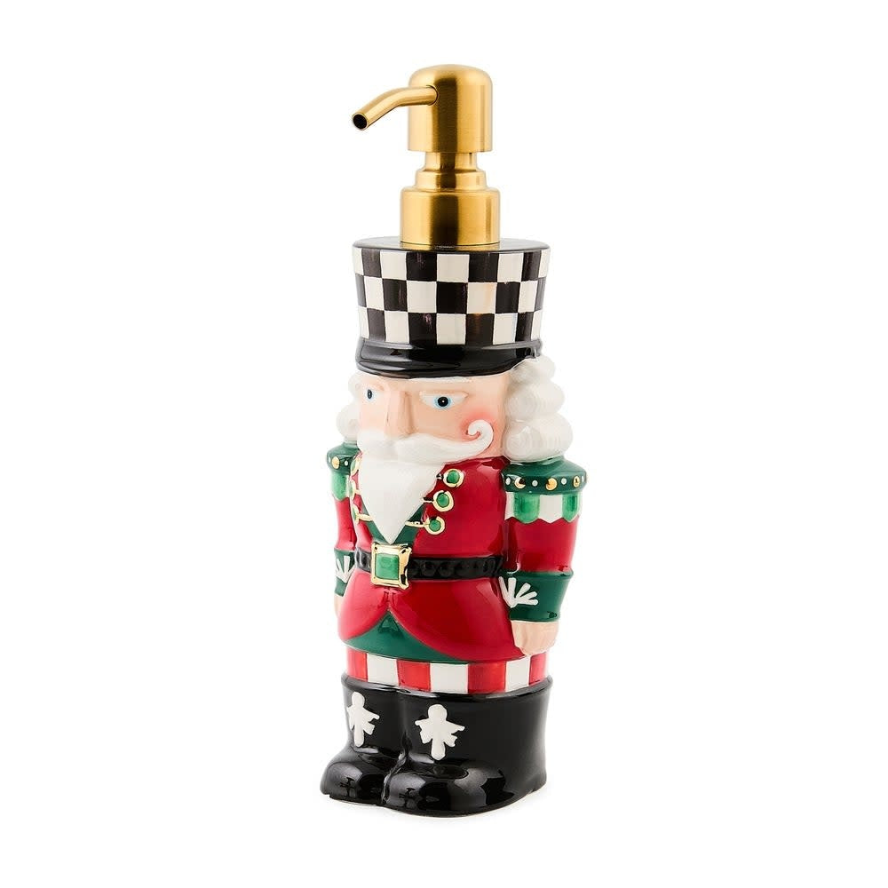 Ceramic nutcracker-shaped soap dispenser in festive red with gold trim.