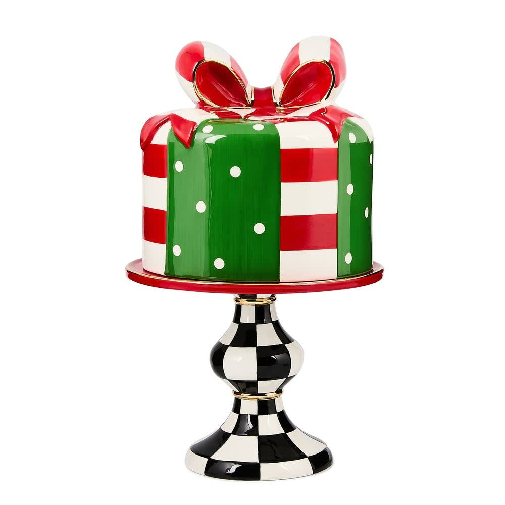 Ceramic lidded cake stand with a festive checkered pattern on the pedestal cover.