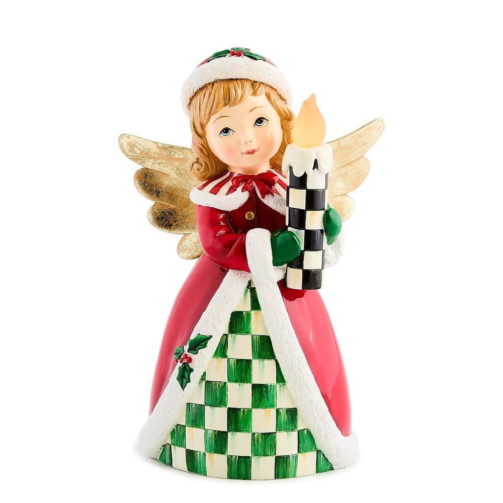 Resin retro angel figurine holding a glowing Courtly Check candle on a bookshelf.