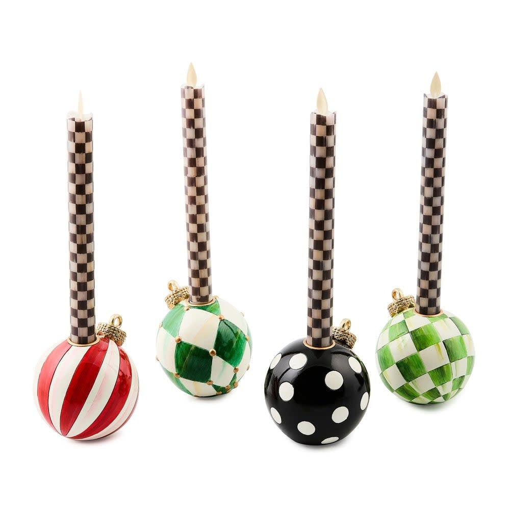 Handmade resin candle holder shaped like a checkered ornament with red and white stripes.