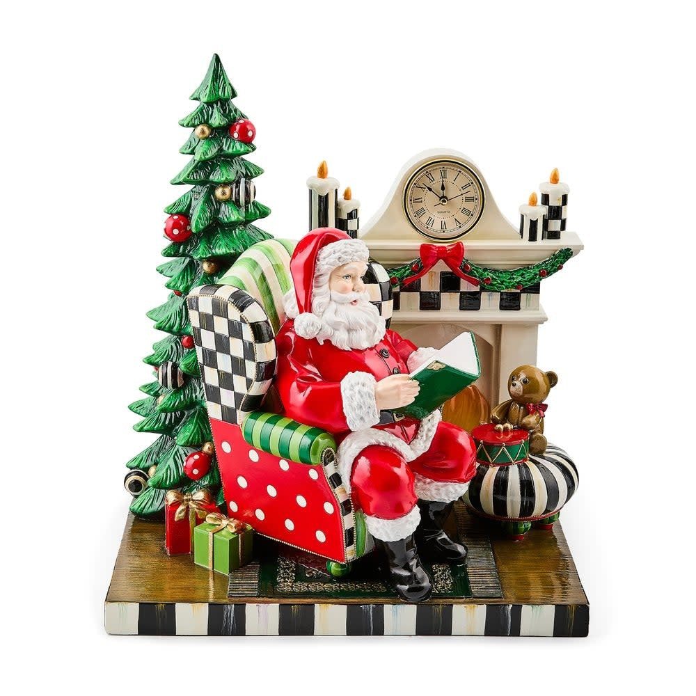 Resin Santa figurine in Courtly Check border pose with fireplace scene