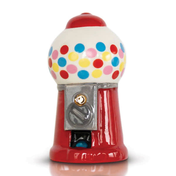 Vintage-style gumball machine filled with multi-color chews