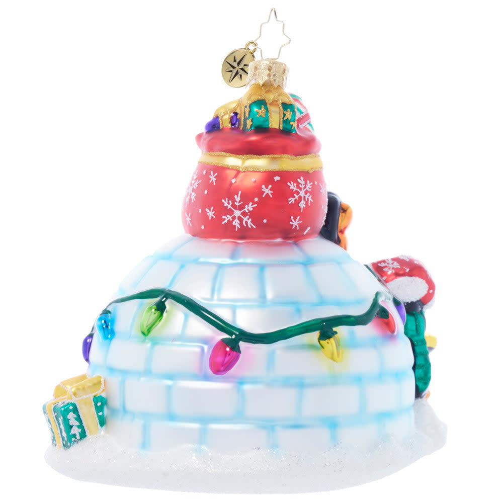 Chilly Igloo Rescue penguin figurine in black and white tuxedo pattern with icy blue base.