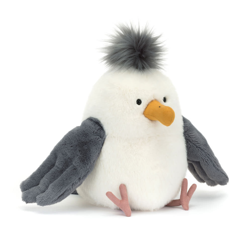 Sitting Jellycat Chip Seagull plush toy with polyester fabric in natural seagull color and punk rock hair style.