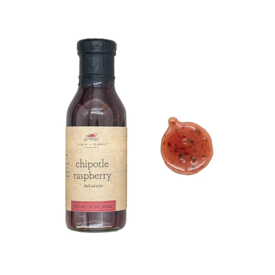 Glass jar containing Chipotle Raspberry Sauce with a red label.