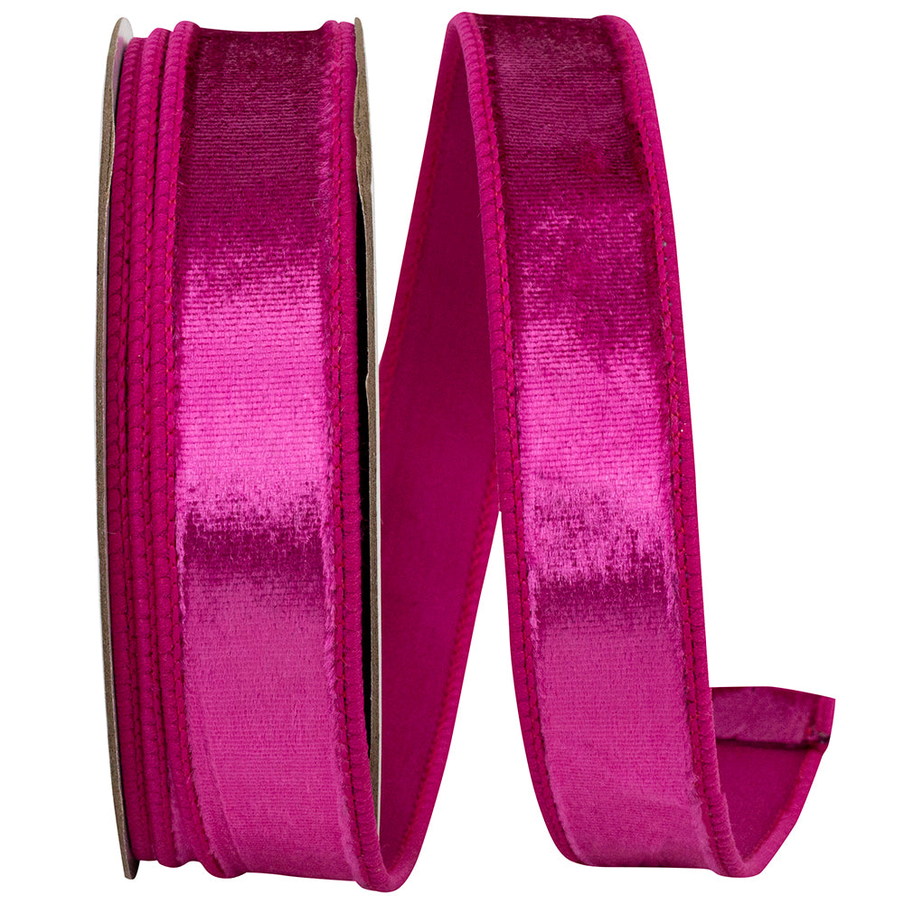 1-inch wide fuchsia pink plush velvet ribbon with a wired edge for holiday crafting.