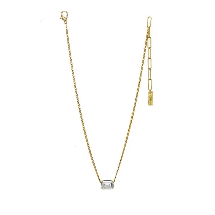 Gold chain necklace with an emerald-cut clear crystal pendant and adjustable paperclip chain link.