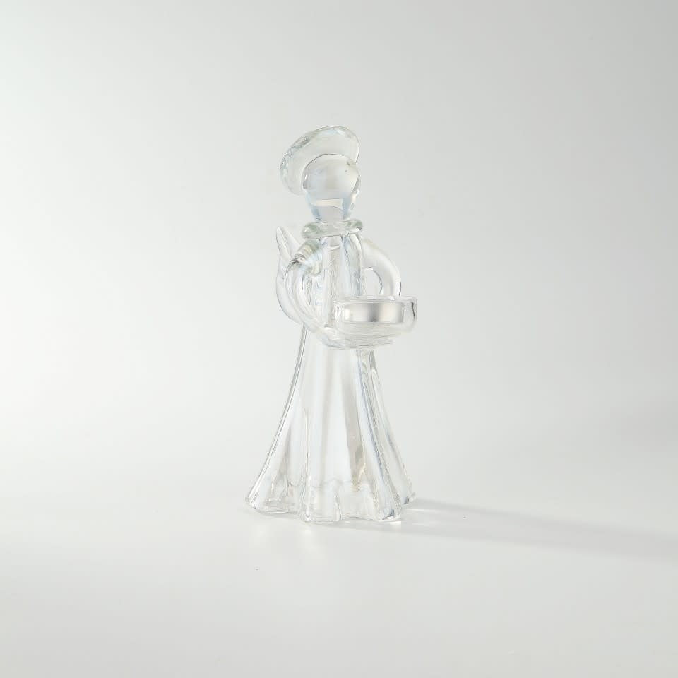 Clear glass Christmas angel figurine with intricate detailing standing ten inches tall.