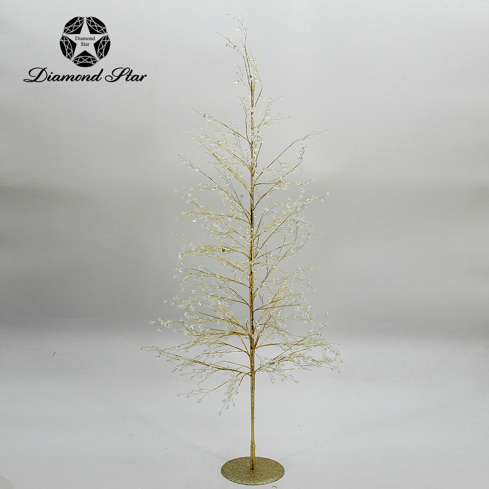 Gold decorative Christmas tree with crystal accents on a glittery base