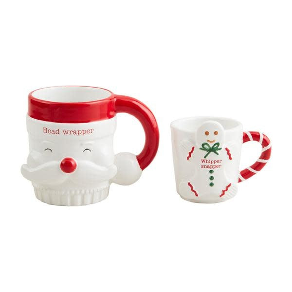 Ceramic Christmas mug set featuring a large Santa figure and small gingerbread man silhouette.