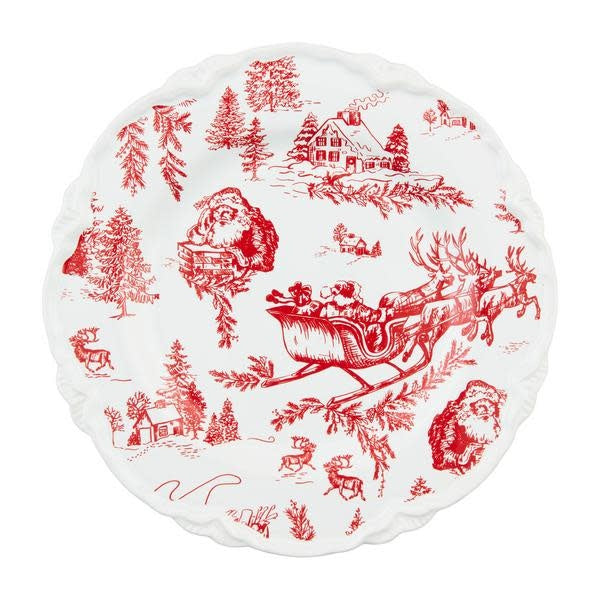 White stoneware dessert plate with a red Christmas tree and snowflake pattern.
