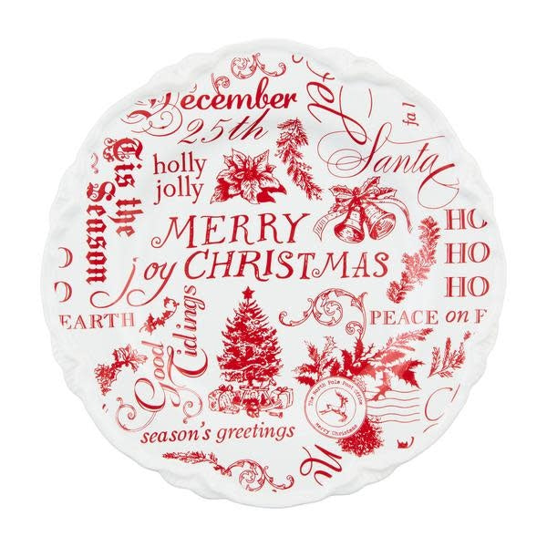 White stoneware dessert plate with red Christmas word print.