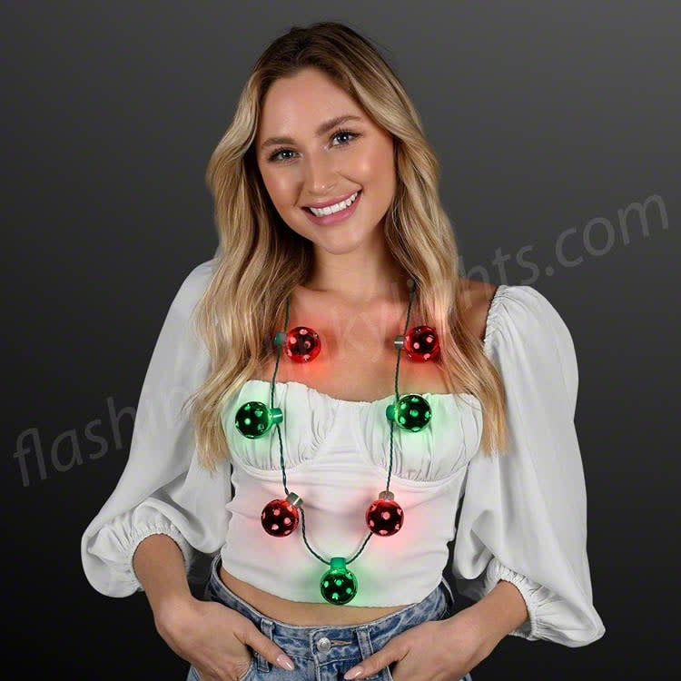 Christmas disco light-up necklace with seven flashing red and green bulbs on a reflective chain.