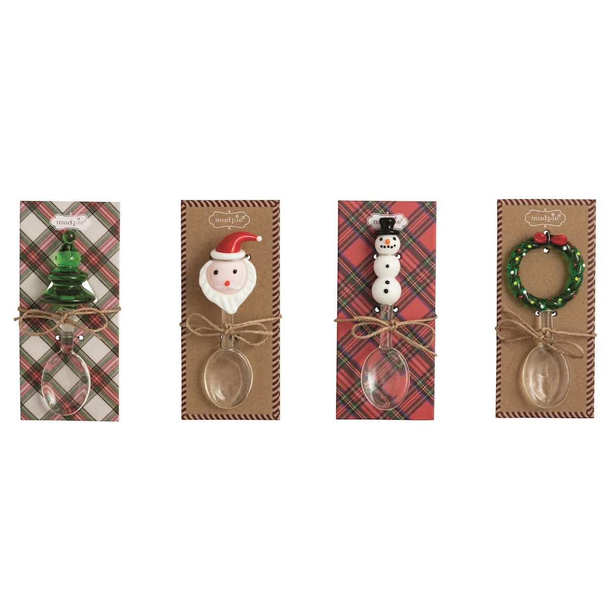 Glass candy scoop with figural handle on a wooden display card.