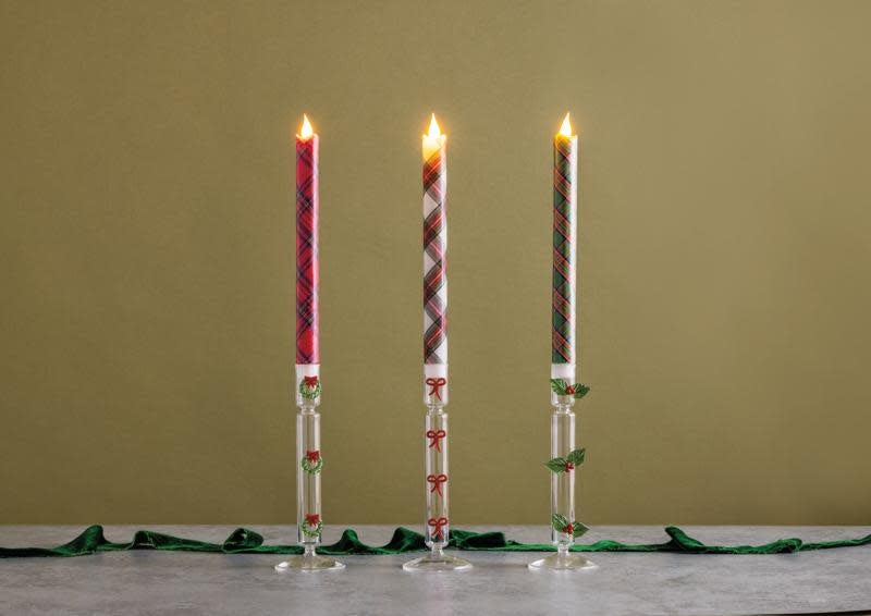 Glass taper candlestick holder with dimensional Christmas icon exterior