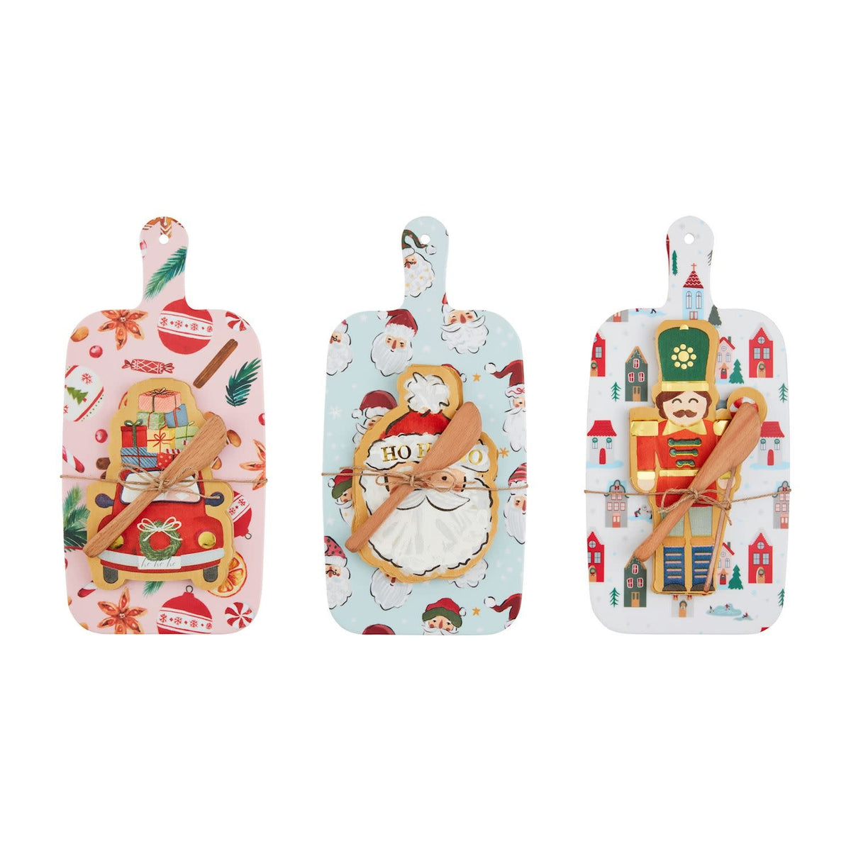 Christmas-patterned melamine paddle board with wooden spreader and figural napkins