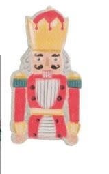Christmas pop-up sponge with nutcracker figure in red, green, and white festive colors.