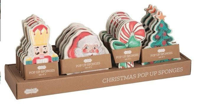 Christmas pop-up sponge with festive red and green holiday patterns.