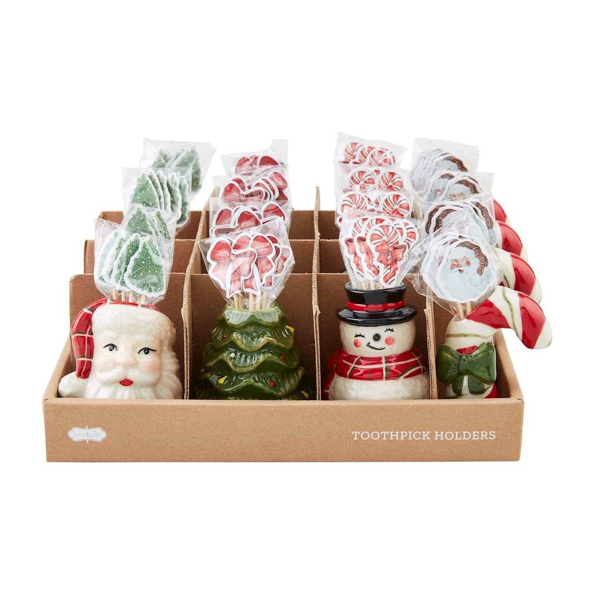 Hand-painted stoneware Christmas caddy with a red stocking figure holding green holly.