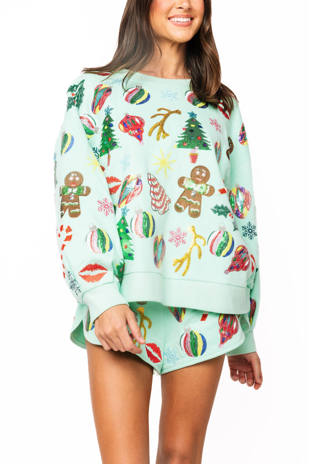 Queen of Sparkles mint multi Christmas icons sweatshirt, front view