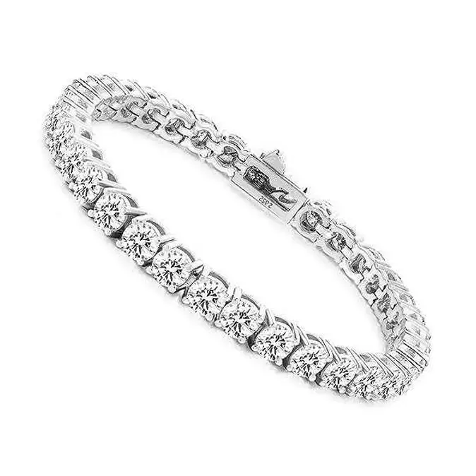 Silver tennis bracelet featuring a continuous line of round-cut diamonds in a prong setting.