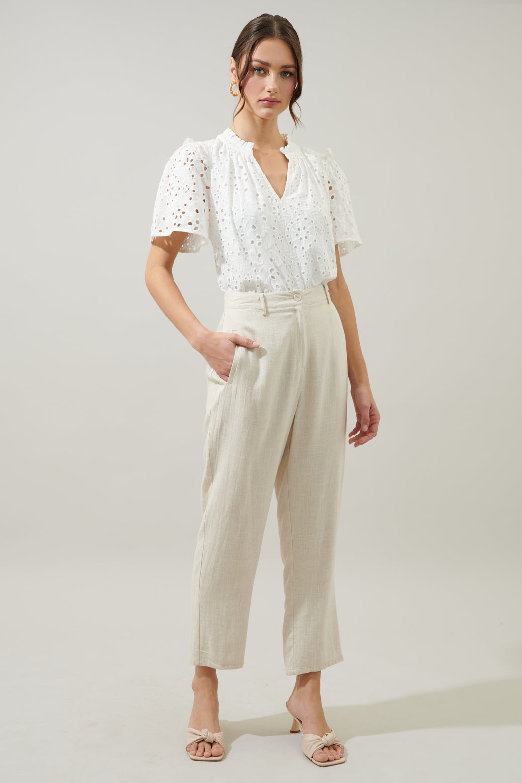 Faye Rain or Shine Eyelet Top in white cotton with a split neckline and relaxed silhouette.
