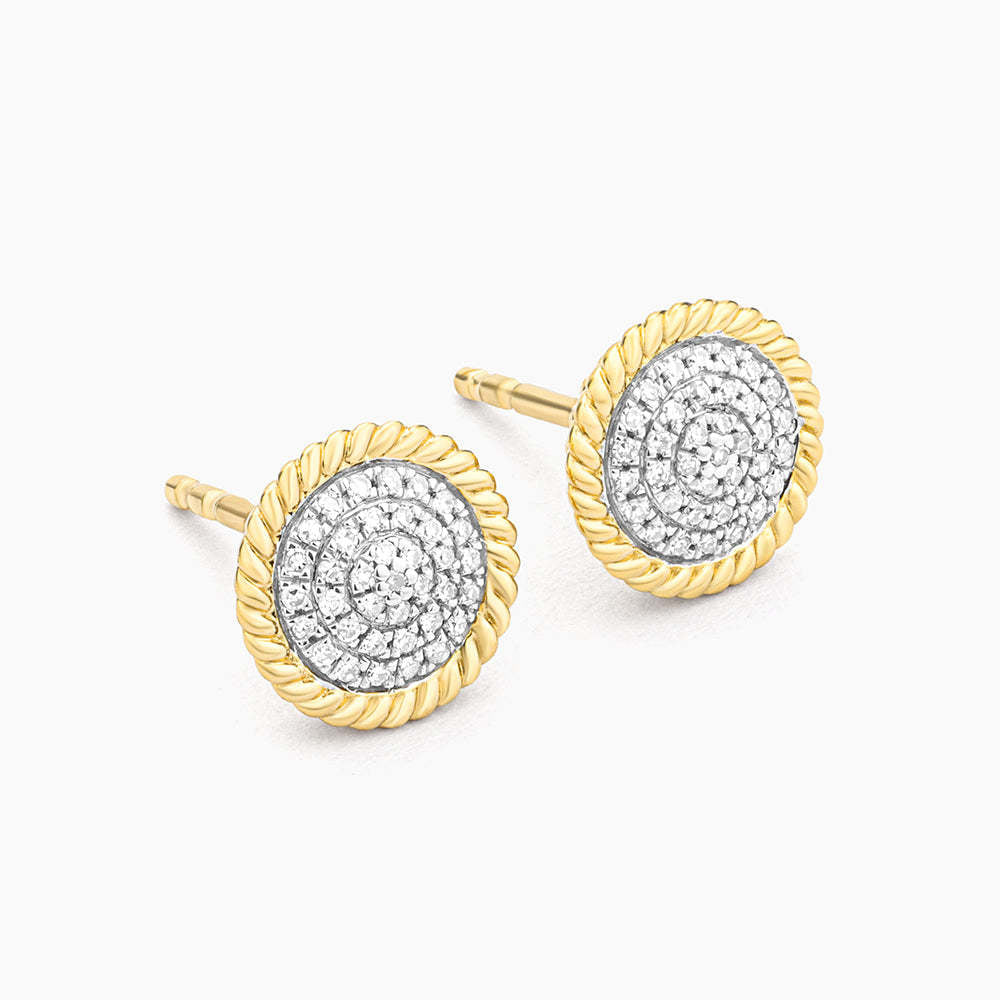 Silver circle rope stud earrings with small diamond accents on a post back closure.