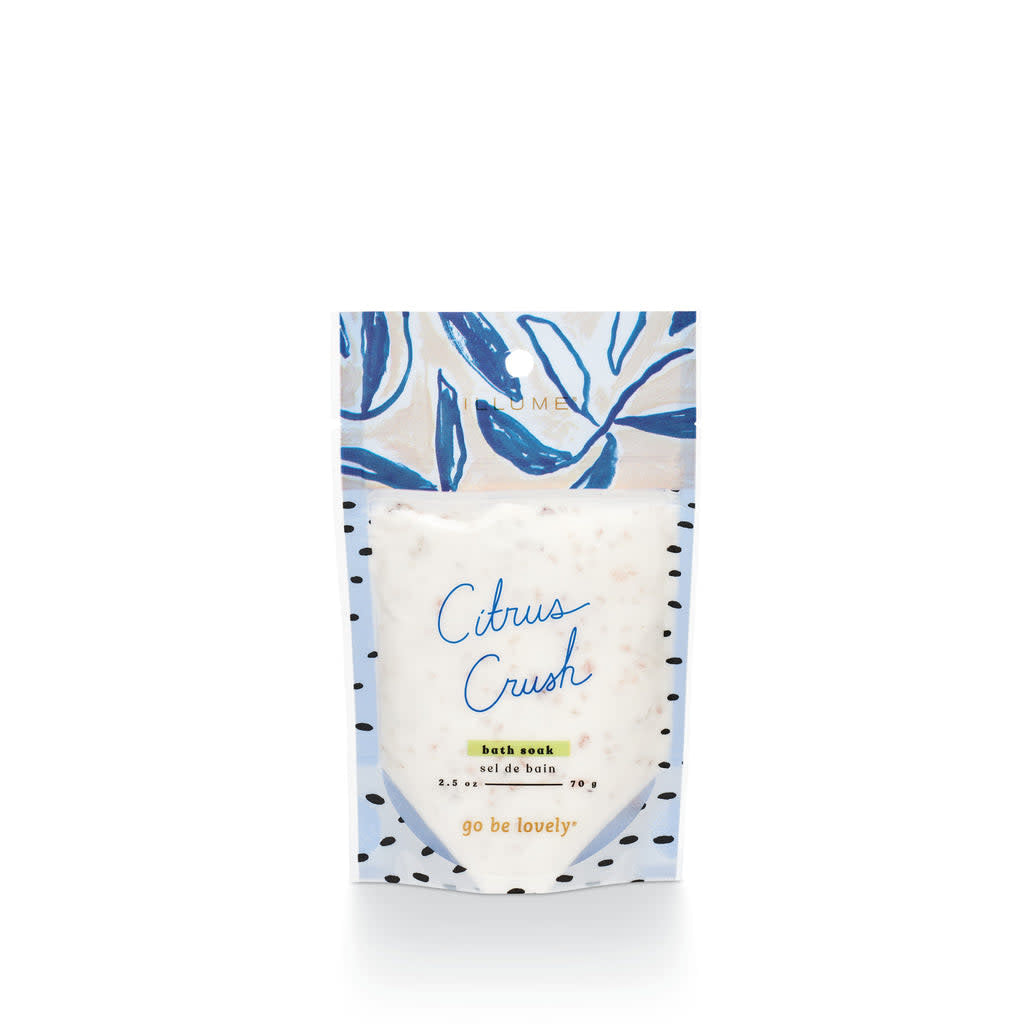Citrus Crush bath soak packet with rose botanicals in a clear pouch