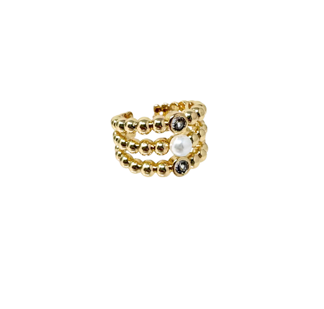 Gold-tone triple-band beaded ring featuring two dark gemstones and a central white pearl.
