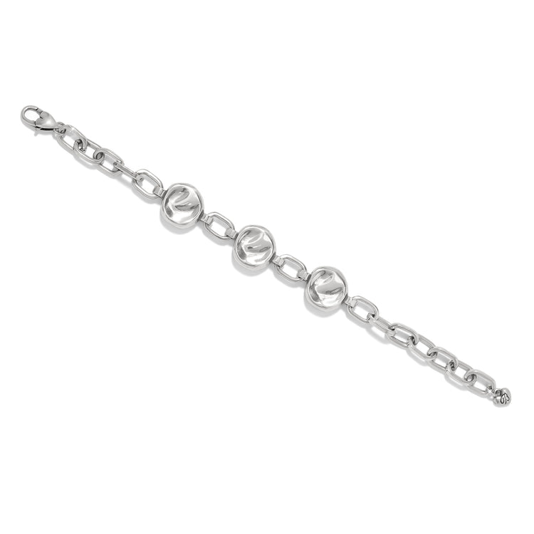 Silver Cascade Round Bracelet with three hammered circular links and an adjustable chain.