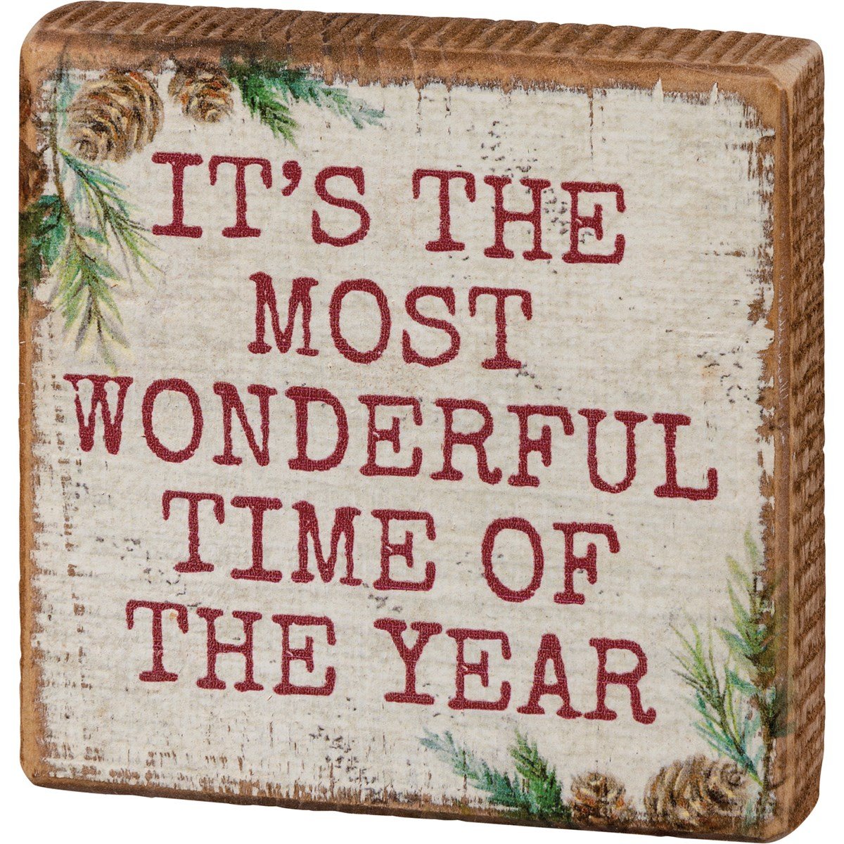 Red wooden block sign with white text reading Jesus Is The Reason For The Season.