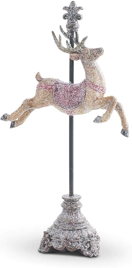 Glittered resin reindeer figurine on a tall stand with a fleur-de-lis finial and pink saddle.
