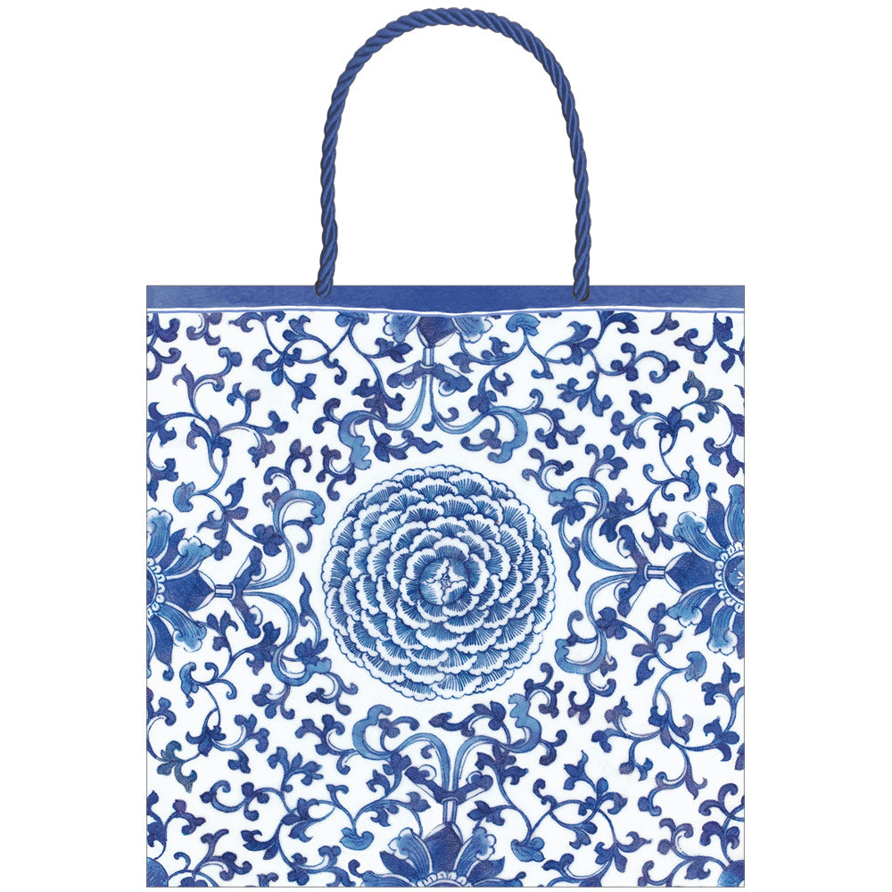 Small square gift bag in indigo garden blue with white accents featuring a strong handle.