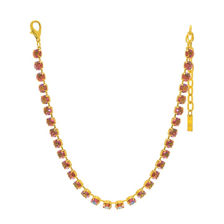 Antique gold plated Oakland necklace with candy crush crystal pendants on a brass chain.