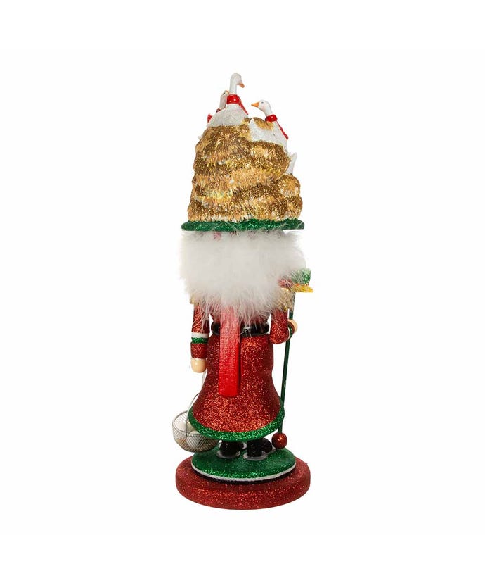Back view of an 18-inch Hollywood Six Geese A Laying nutcracker with glittery red and gold details.